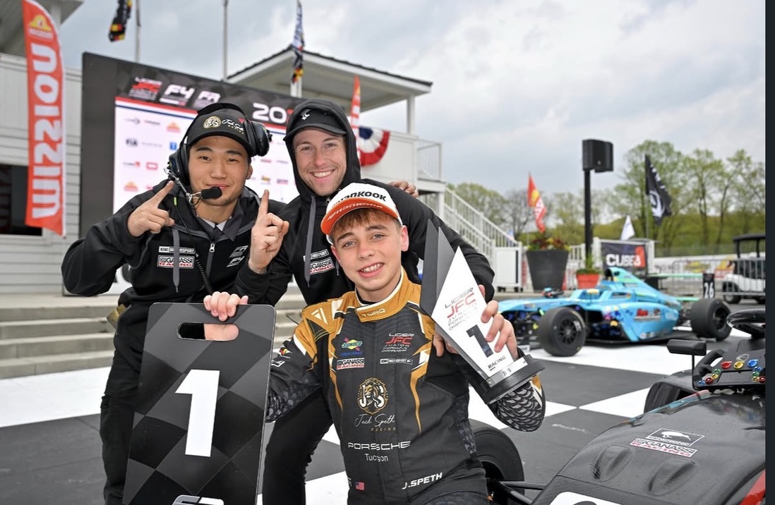 Jack Speth celebrating a win with his Kiwi Motorsport crew